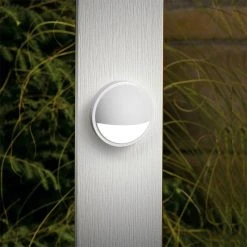 3.3" White LED Eyelid Step/Deck Light - 30 Lumens, 2700K Warm Glow - Low Voltage Landscape Lighting 13 3.3" White LED Eyelid Step/Deck Light - 30 Lumens, 2700K Warm Glow - Low Voltage Landscape Lighting -Nebo Sales Store ell 27k2w wh close uo on fence