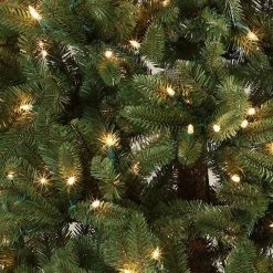 Mini Blue LED Christmas String Lights - 25ft, 50 Faceted M5 Bulbs, Green Wire - Energy Efficient Holiday Decor -Nebo Sales Store m5 50lt x close up